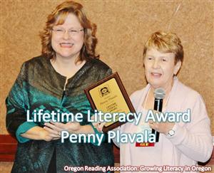 Penny Plavala receiving award