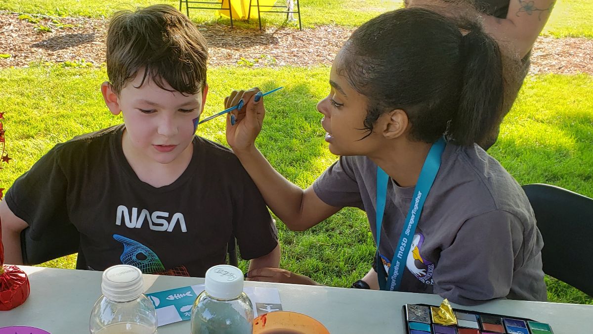 Student getting their face painted